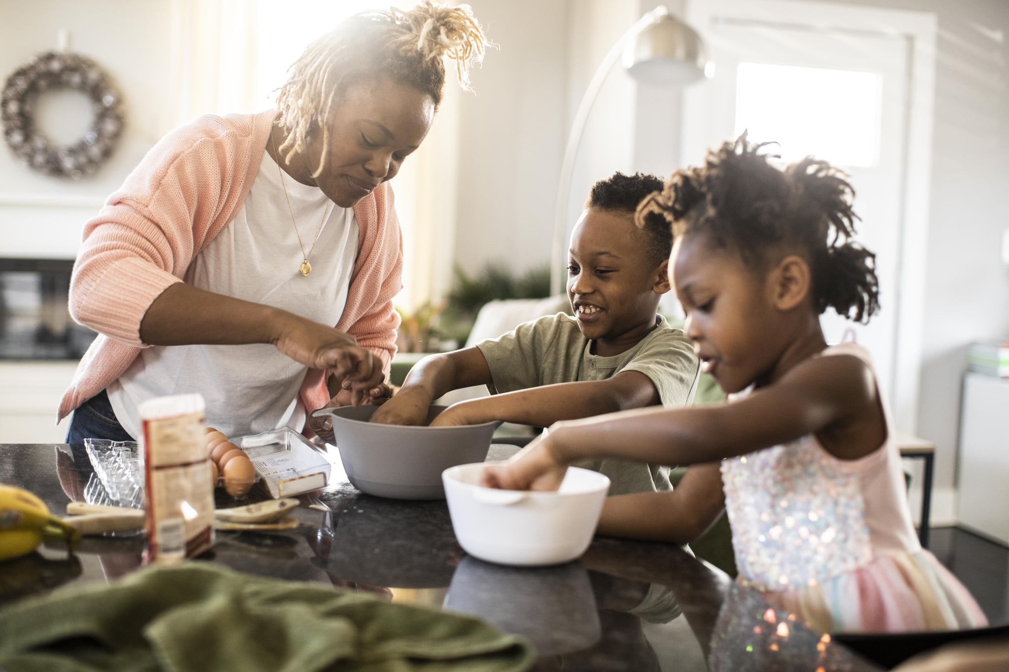 <p>Ready to bake a cake as fast as you can? On second thought, what's the rush on a blustery day when you have nowhere to go? Choose a <a href="https://www.popsugar.com/family/kid-friendly-baking-recipes-47417812" class="ga-track">family-friendly recipe</a> for bread, cake, cookies, or whatever your cravings call for, and make a warm baked good that hits directly on the coldest of days. Even tiny tykes can help with small tasks that feel like big deals to them, like pouring pre-measured ingredients into a mixture. </p>