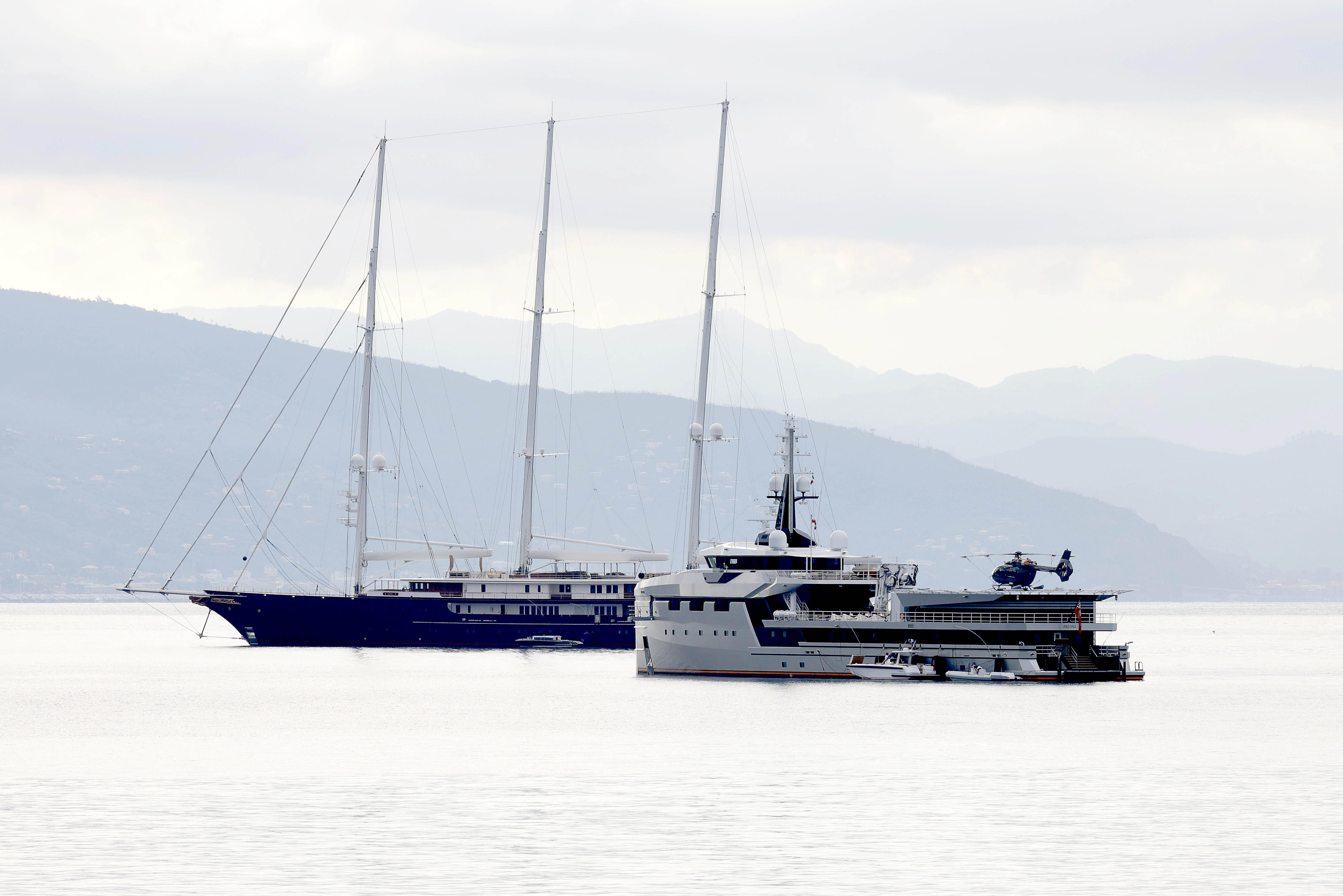 Jeff Bezos' fiancée, Lauren Sanchez, says she wasn't the inspiration for the figurehead of a woman on the Amazon founder's yacht, Koru, seen at left, with its support vessel, Abeona, seen at right. <a>Robino Salvatore/GC Images</a>