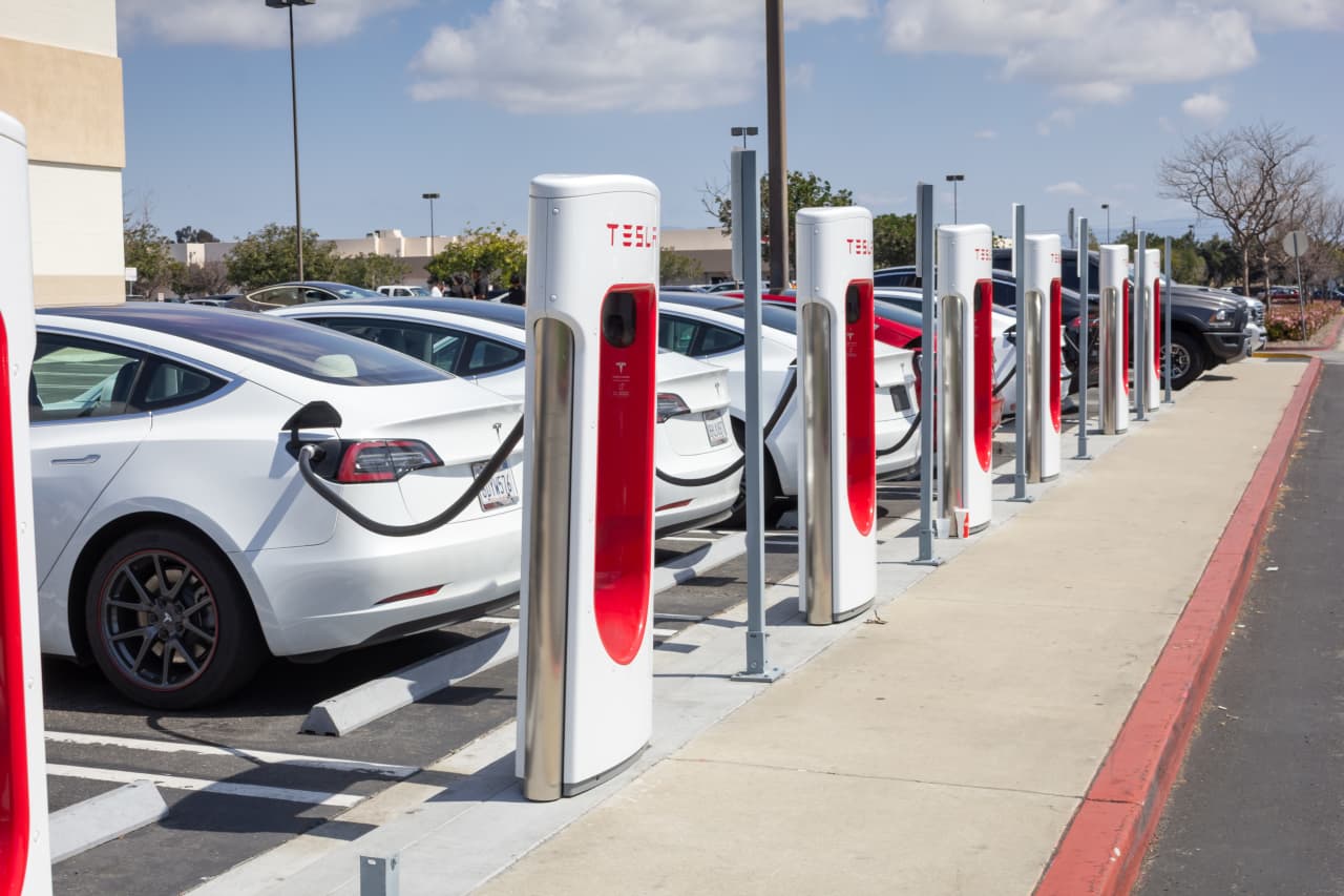 tesla to spend more than $500 million to expand supercharger network, musk says. the stock rises.