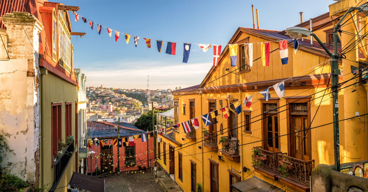 <p> About an hour-and-a-half drive northwest of Chile’s capital city of Santiago is the hillside port city of Valparaiso. </p><p>Situated on the coast, the city is known for its steep funiculars (a transportation system that combines the technology of an elevator with that of a railroad, resulting in a cable pulley system and a car on a track), charming colonial architecture, and cliff-top homes. </p> <p> New visitors can spend endless hours strolling the city’s narrow streets, discovering the different levels as they climb its endless staircases, and taking in the sweeping views from the city’s many lofty lookout points.</p>