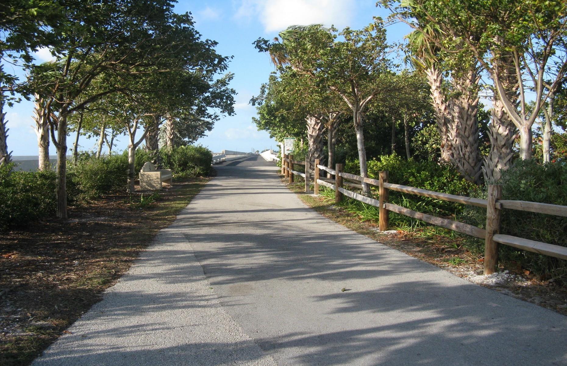 <p>The Florida Keys Overseas Heritage Trail is a series of multi-use paths and trails that link together all the towns in the <a href="https://www.loveexploring.com/guides/73827/explore-the-florida-keys-where-to-stay-what-to-eat-the-top-things-to-do">Florida Keys</a>. They follow the route of a former railroad line originally built by American industrialist and founder of the Florida East Coast Railway, Henry Flagler, in 1912. A ride along the paved cycle trail offers the chance to weave through the colorful Keys communities and over Flagler’s historic railroad bridges.</p>
