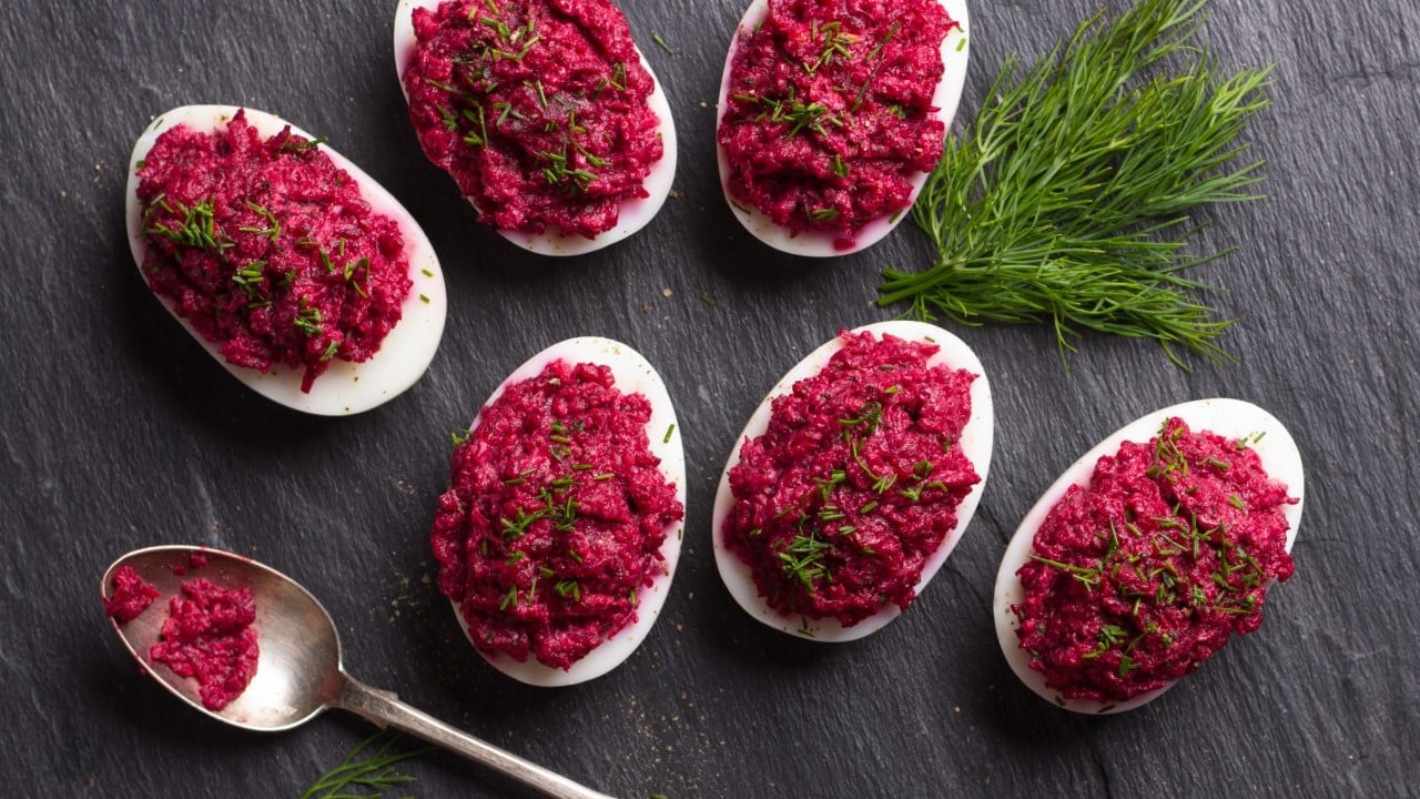 <p>Deviled eggs are usually yellow and white, but you can make them red and black with a little culinary magic. Dye the eggs black with activated charcoal and make the filling blood red with beet juice or chili powder. You can always use food dye, too!</p>