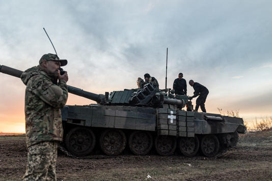 Four Ukrainian army soldiers of the 22nd Mechanized Brigade training with a tank in Donetsk Oblast, Ukraine on October 29, 2023. Anadolu Agency