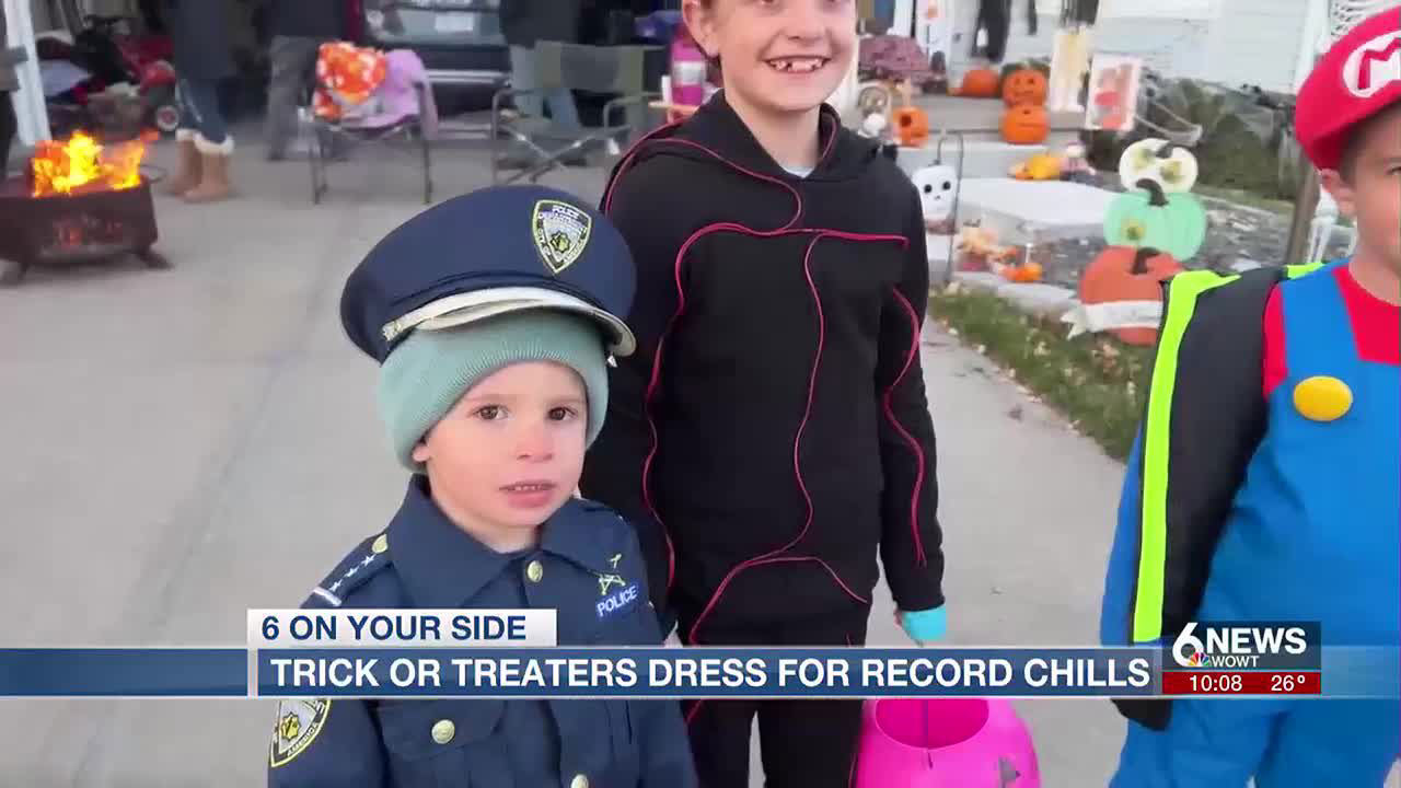 Omaha trickortreaters dress for near record low chills