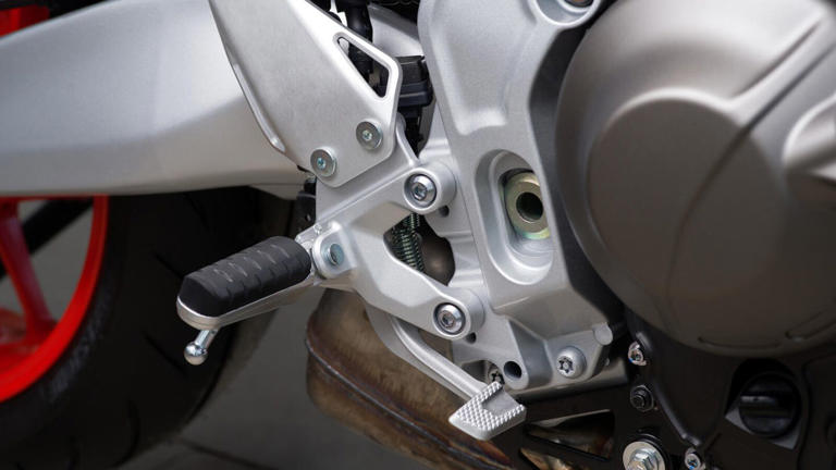Aluminum footrests are adjustable, but come set at the upper position to emphasize sportiness on the Yamaha XSR900 GP, which is only available for purchase in Europe.