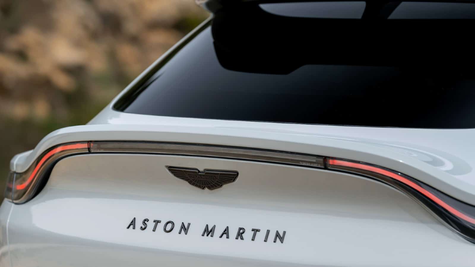 the aston martin share price has halved. time to buy?