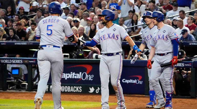The Rangers committed $500 million to signing Seager and Semien (center) in 2021. Rob Schumacher/Arizona Republic/USA TODAY NETWORK