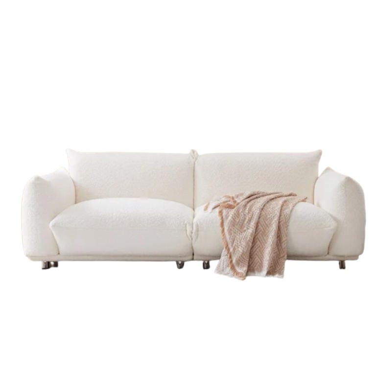 What color sofa makes a small living room look bigger? Designers explain