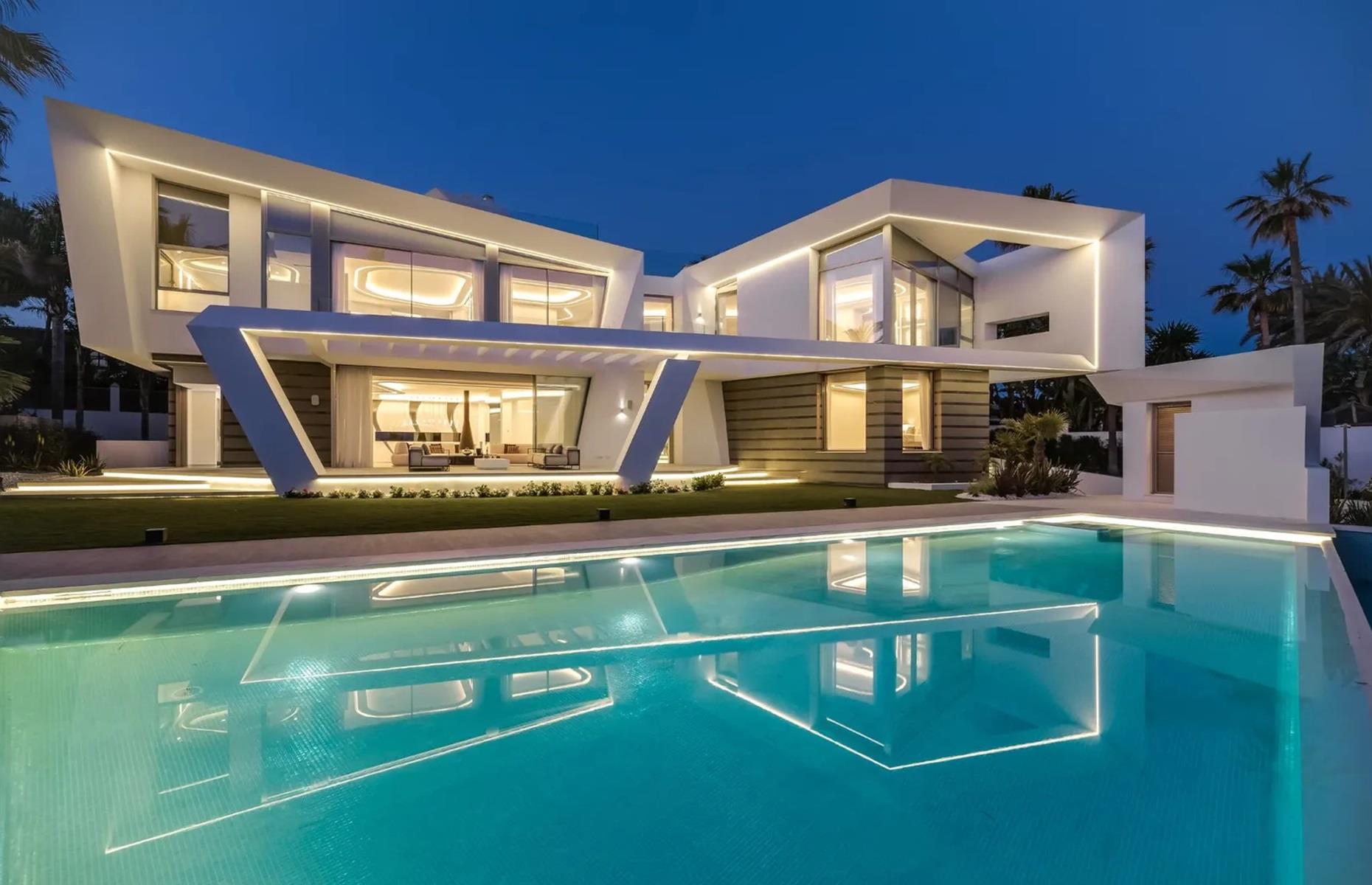 <p>Plus, there's an absolutely stunning backyard and a private rooftop terrace, where dreamy <a href="https://www.loveproperty.com/gallerylist/54730/11-incredible-homes-by-the-sea">sea views</a> can be savoured. The latter comes with a Jacuzzi pool, numerous lounging areas and dining decks for sunbathing and entertaining in style.</p>  <p>Loved this? <a href="https://bit.ly/45Wk23x"><strong>Follow us on Facebook</strong></a> for more incredible modern homes.</p>