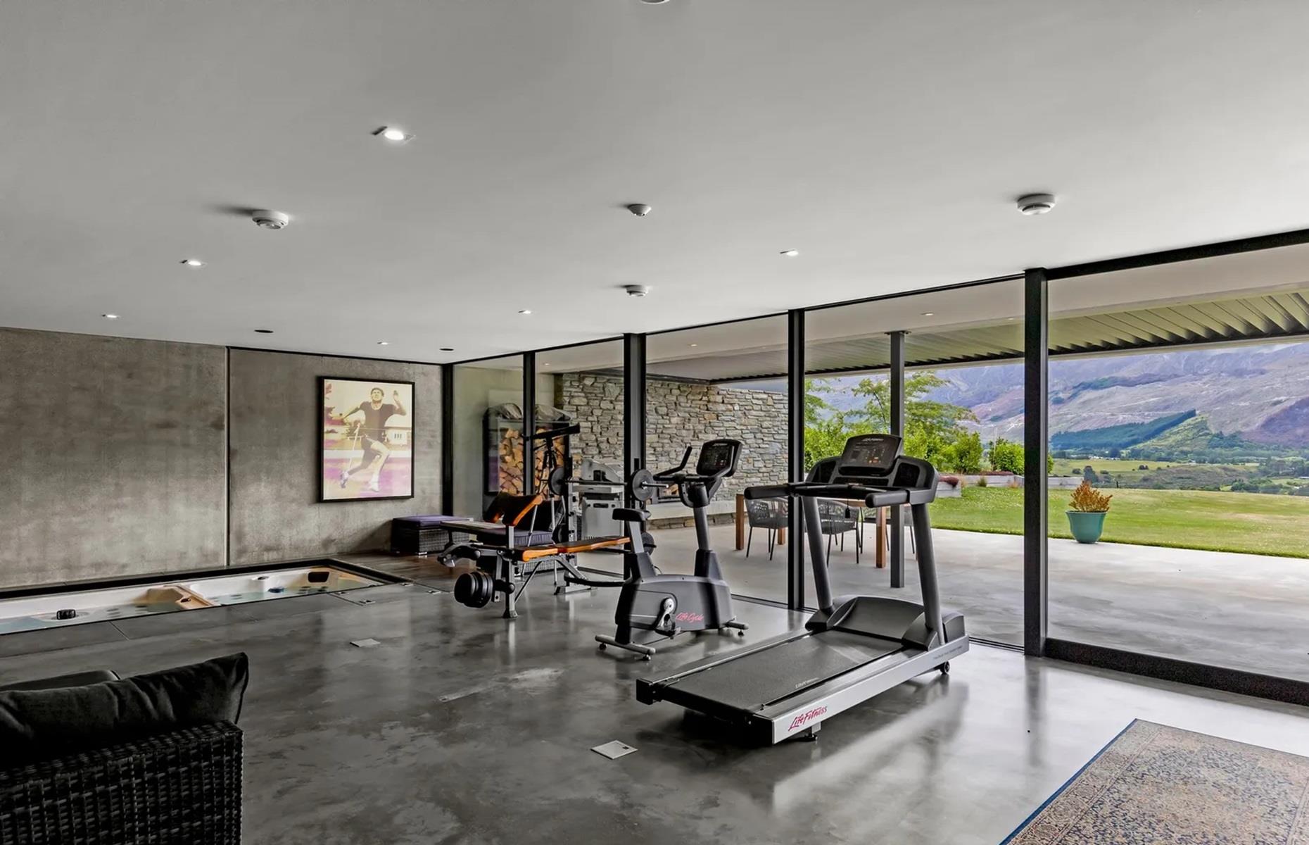 <p>Below the master bedroom is an awesome gym, kitted out with an indoor “endless” swimming pool, a spa and a sauna. The space opens to an outdoor entertaining area, so the lucky owner can take their workouts alfresco. If you've fallen in love, then the property is for sale right now for an undisclosed sum.</p>