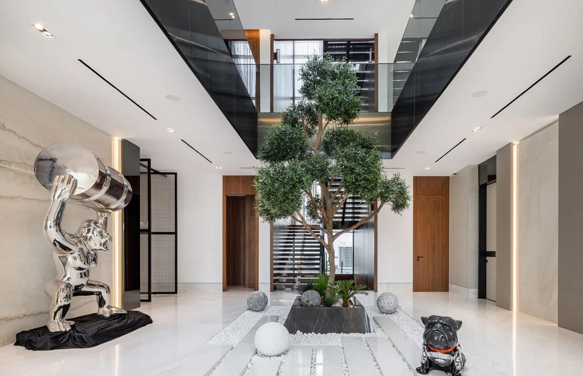 <p>Brand-new, the lucky buyer will be the first owner of the property, which benefits from endless <a href="https://www.loveproperty.com/gallerylist/55904/32-items-for-the-home-only-billionaires-can-afford">amazing extras</a> that only a billionaire could afford. As well as the usual suspects – a family living area, a formal dining room, a bespoke kitchen, six bedrooms and six bathrooms – the pad also features a gorgeous, Japanese-inspired atrium, a cigar room and a prayer room. But that isn’t nearly all…</p>