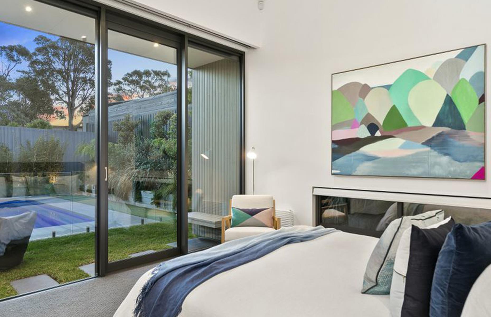 <p><a href="https://www.realestate.com.au/property/23-holmwood-ave-anglesea-vic-3230/">The property</a> was constructed using a combination of glass and concrete, resulting in a brutalist, bunker-like aesthetic. Inside, the same materials continue, complemented by light timber floors and crisp white walls. </p>