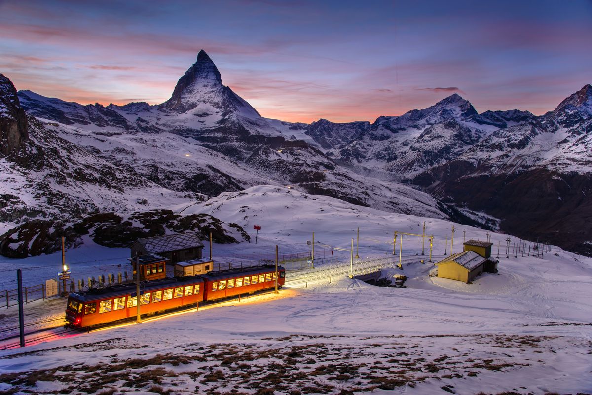 <p>Switzerland is synonymous with train travel, thanks in part to the impeccably clean coaches, reliably accurate timetables, and striking landscapes found in every region. Visit Zermatt, a car-free village at the base of the Matterhorn. While the city itself offers an impressive view of the mountain, a ride aboard the Gornergrat-Bahn climbs more than 10,000 feet into the Alps for an even better view. From here, you can view glaciers, ski runs, and the amazing Alps as far as the eye can see, plus enjoy immersive experiences, an onsite restaurant, and more.</p>