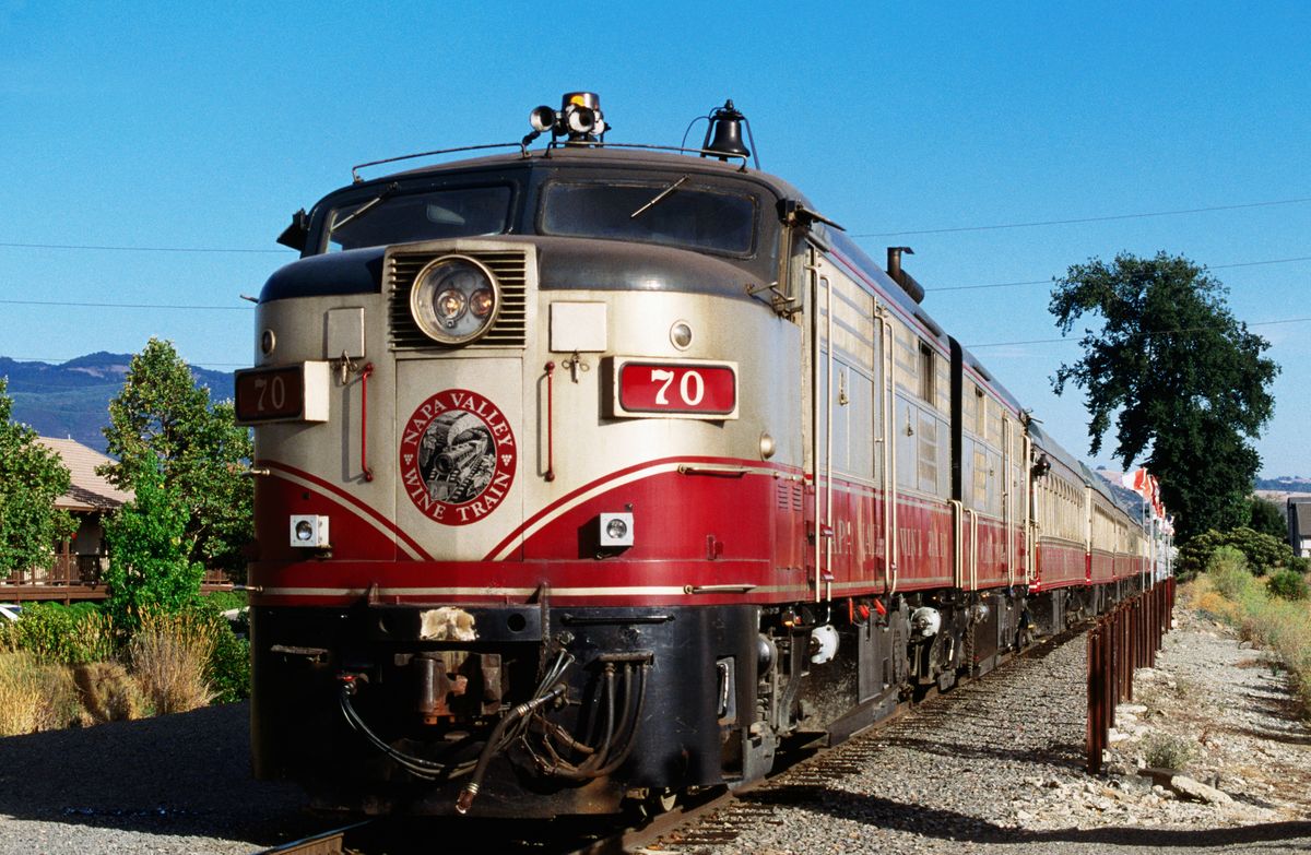 <p>You’ll need to leave the keys behind during a visit to Napa Valley’s historic vineyards, so the <a href="https://www.winetrain.com/">Wine Train</a> has your transportation covered. Board a 100 year old train car for a six-hour journey through the valley, stopping at a handful of prominent vineyards for tastings along the way. While on board, enjoy a welcome glass of bubbles, a four-course meal, and plush interiors while cruising through stunning landscapes.</p>