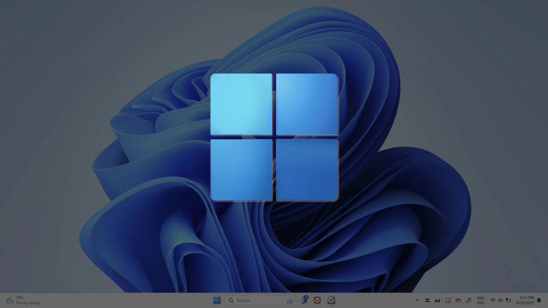 A screenshot of the Windows 11 Bloom wallpaper with the Windows 11 Start menu icon laid on top