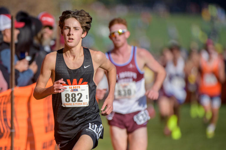 Winnebago's Nicolai Martino (882) runs to a seventh-place finish in a time of 14:57.55 in the Class 1A boys state cross country championship Saturday, Nov. 4, 2023 at Detweiller Park in Peoria.