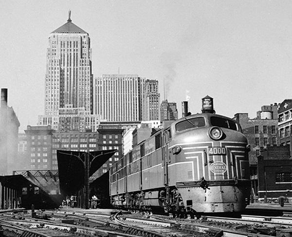 Wearing an early version of New York Central's "lightning stripe" passenger livery, two EMD E7s are ready to depart La Salle Street Station, Chicago, with the 20th Century Limited in 1946. New York Central Railroad