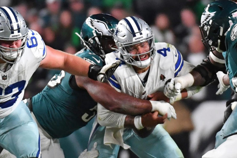 Brandon Graham sacking Dallas Cowboys quarterback Dak Prescott. USA Today