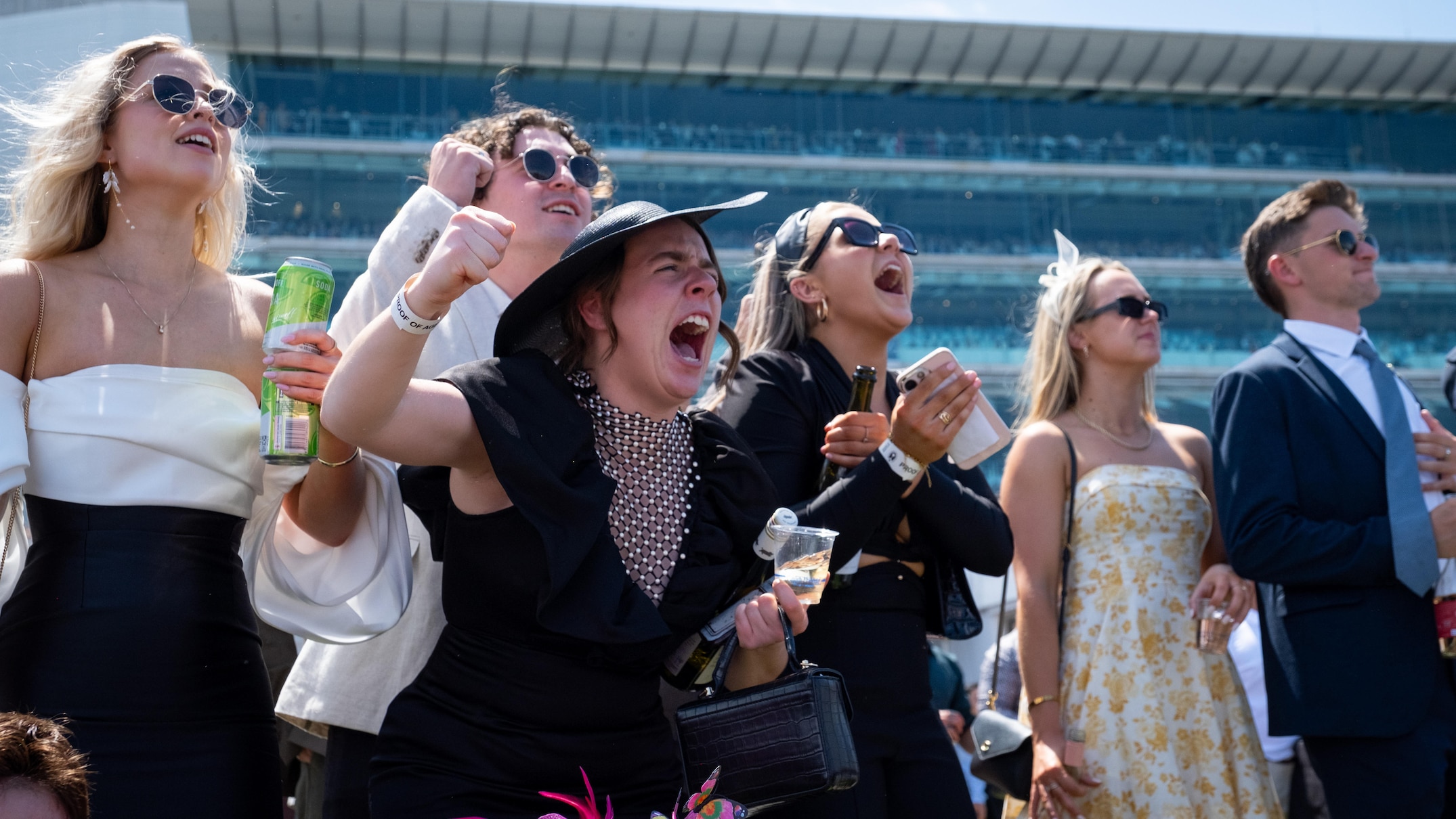 Crowds enjoy the big race on warm Melbourne Cup day at Flemington