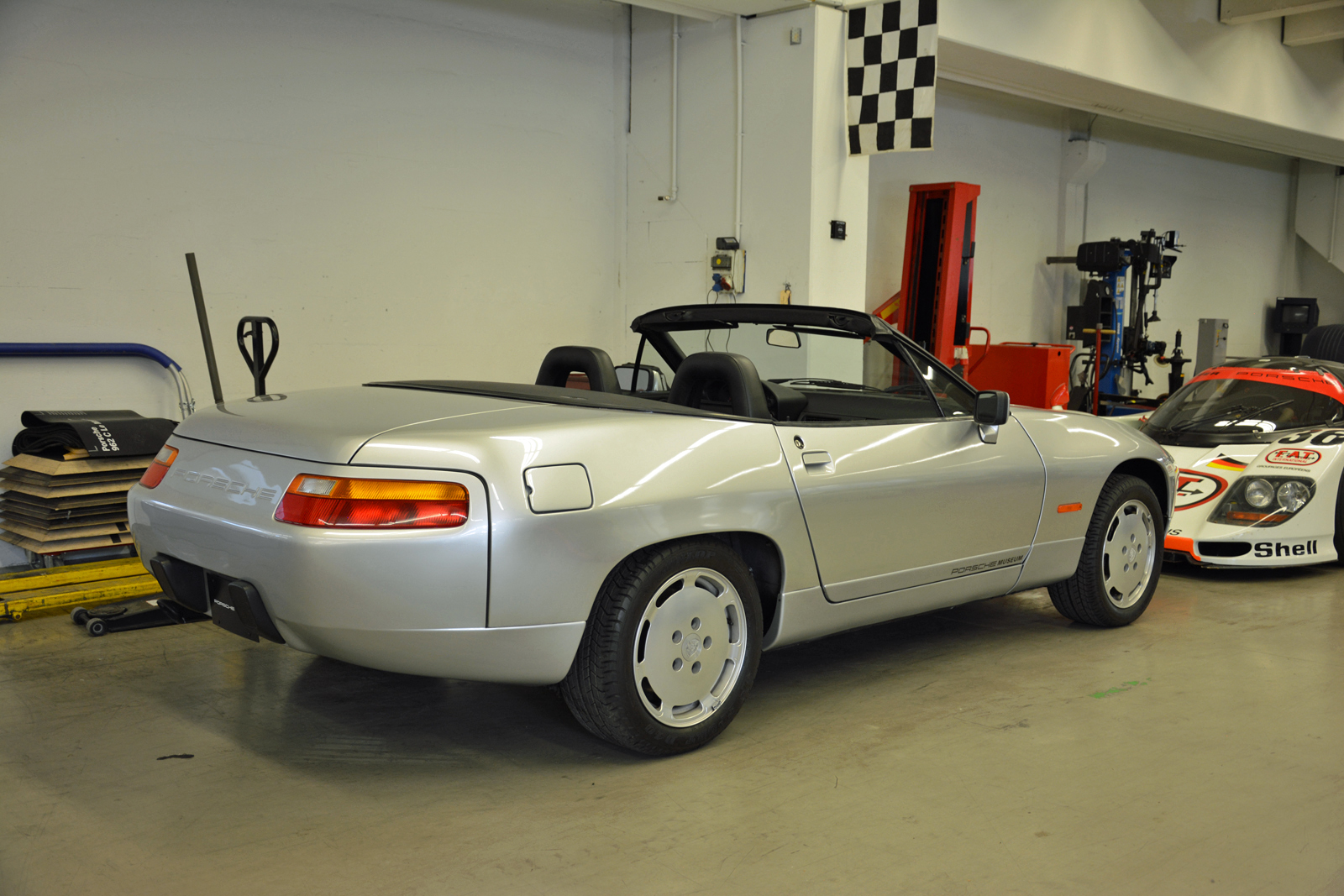 <p>The convertible was all but identical to the standard 928 from the rocker panels up to the belt line. Above that, it gained a long deck lid and a cloth soft top which was stored directly behind the passenger compartment. The convertible conversion transformed the 928 from a 2+2 into a two-seater, and made it <strong>110 lb </strong>heavier.</p>