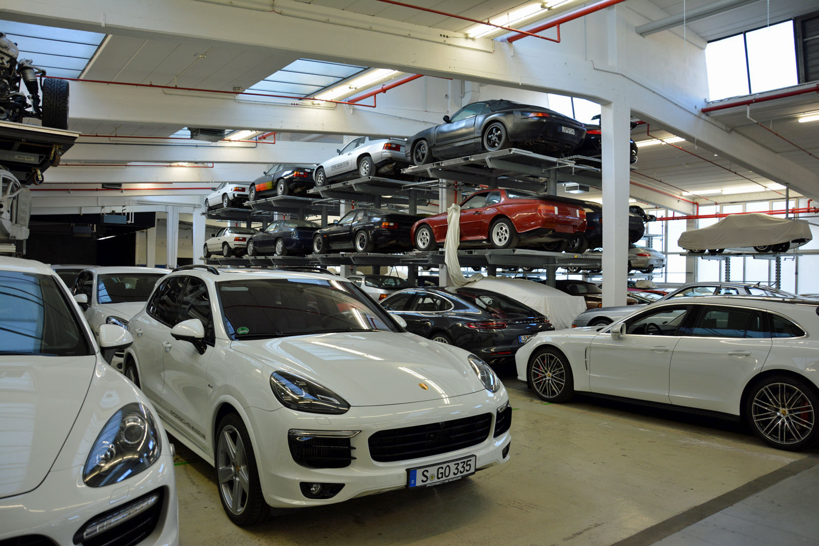 <p>Part of the warehouse is dedicated to front-engined cars like the 924, the 944, the Cayenne and the Panamera. One of Porsche’s most recent models, the Panamera Sport Turismo, already has a spot in the collection next to the sedan version. It’s the most <strong>recent addition</strong> to the vault.</p>