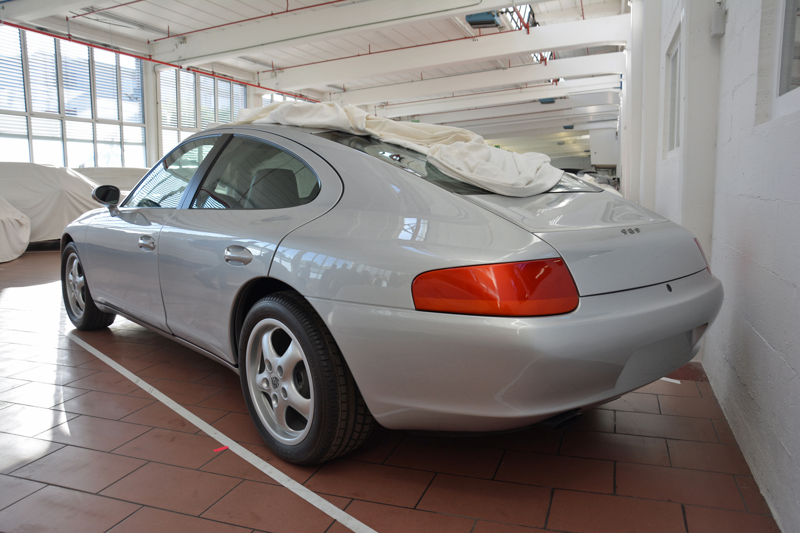 <p>The 989 came close to production; a 1995 launch date was even locked in. Porsche executives canceled the project in 1991 after realizing the 989 would be <strong>far too expensive</strong> to design and build. The 996-series 911 borrowed a few styling cues from the 989, but the idea of a Porsche sedan for four was dropped for over a decade.</p>