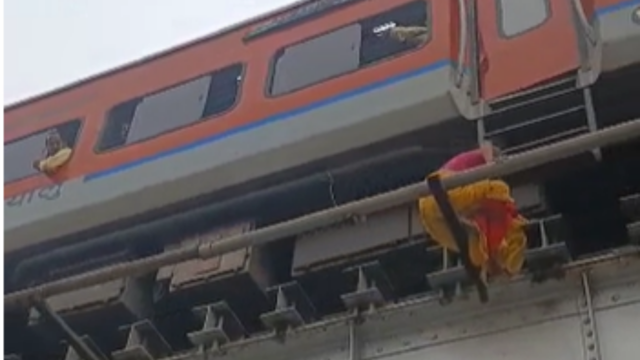 On Camera Woman Balances Herself On 4 Foot Pipe To Save Her From Approaching Train