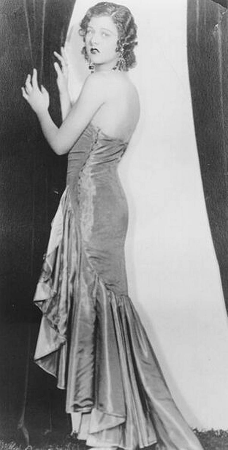 This publicity photo of singer and Broadway starlet Libby Holman in a groundbreaking strapless gown was widely published in newspapers after she was charged with first-degree murder in the death of her new husband, Z. Smith Reynolds.