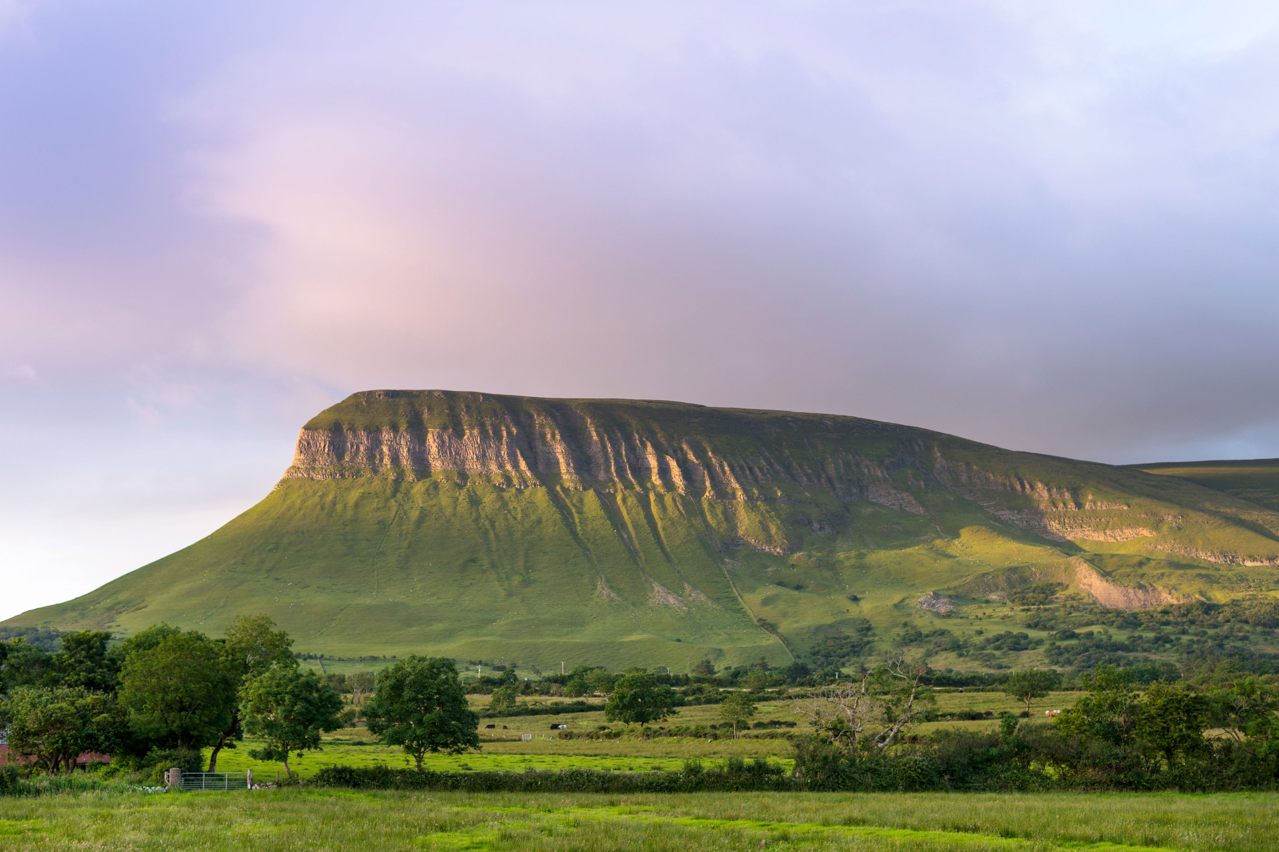 <p><strong>Location:</strong> County Sligo</p> <p>Formed hundreds of millions of years ago, this limestone formation hovers over Sligo like something from a <a href="https://www.cntraveler.com/story/books-to-read-this-summer?mbid=synd_msn_rss&utm_source=msn&utm_medium=syndication">fantasy novel</a>. Benbulben’s paved trails make it a popular destination for hikers and climbers, but the peak is perhaps best known for its literary associations. Irish poet W. B. Yeats drew inspiration from the mountain and its surrounding landscapes, most notably in his 1938 poem “Under Ben Bulben.”</p><p>Sign up to receive the latest news, expert tips, and inspiration on all things travel</p><a href="https://www.cntraveler.com/newsletter/the-daily?sourceCode=msnsend">Inspire Me</a>