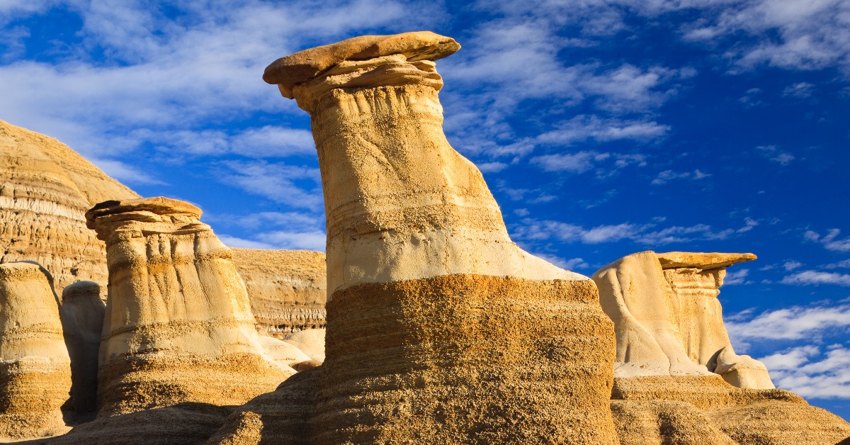 <p> The hoodoos in the Badlands of Alberta are one of the most unique natural formations in Canada. Erosion created these strange but beautiful rock pillars — which stand as high as 20 feet — over time.  </p> <p> Don't forget to check out Dinosaur Provincial Park, located nearby. This park is home to some amazing dinosaur fossils. </p>