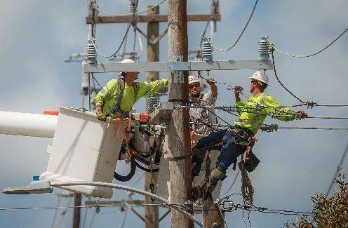 Lake Worth Electric Utility workers.