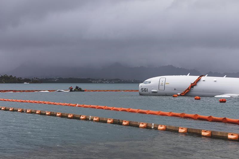 us navy removes fuel from plane that overshot hawaii runway and is now resting on a reef and sand