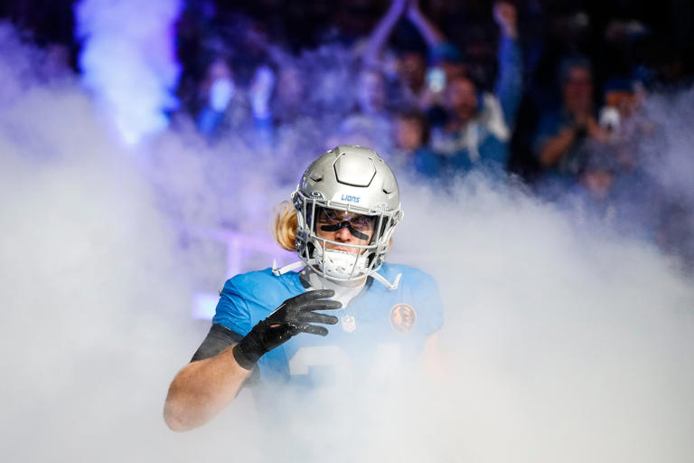 Detroit Lions linebacker Alex Anzalone is introduced to the crowd before the Green Bay Packers game at Ford Field in Detroit on Thursday, Nov. 23, 2023.