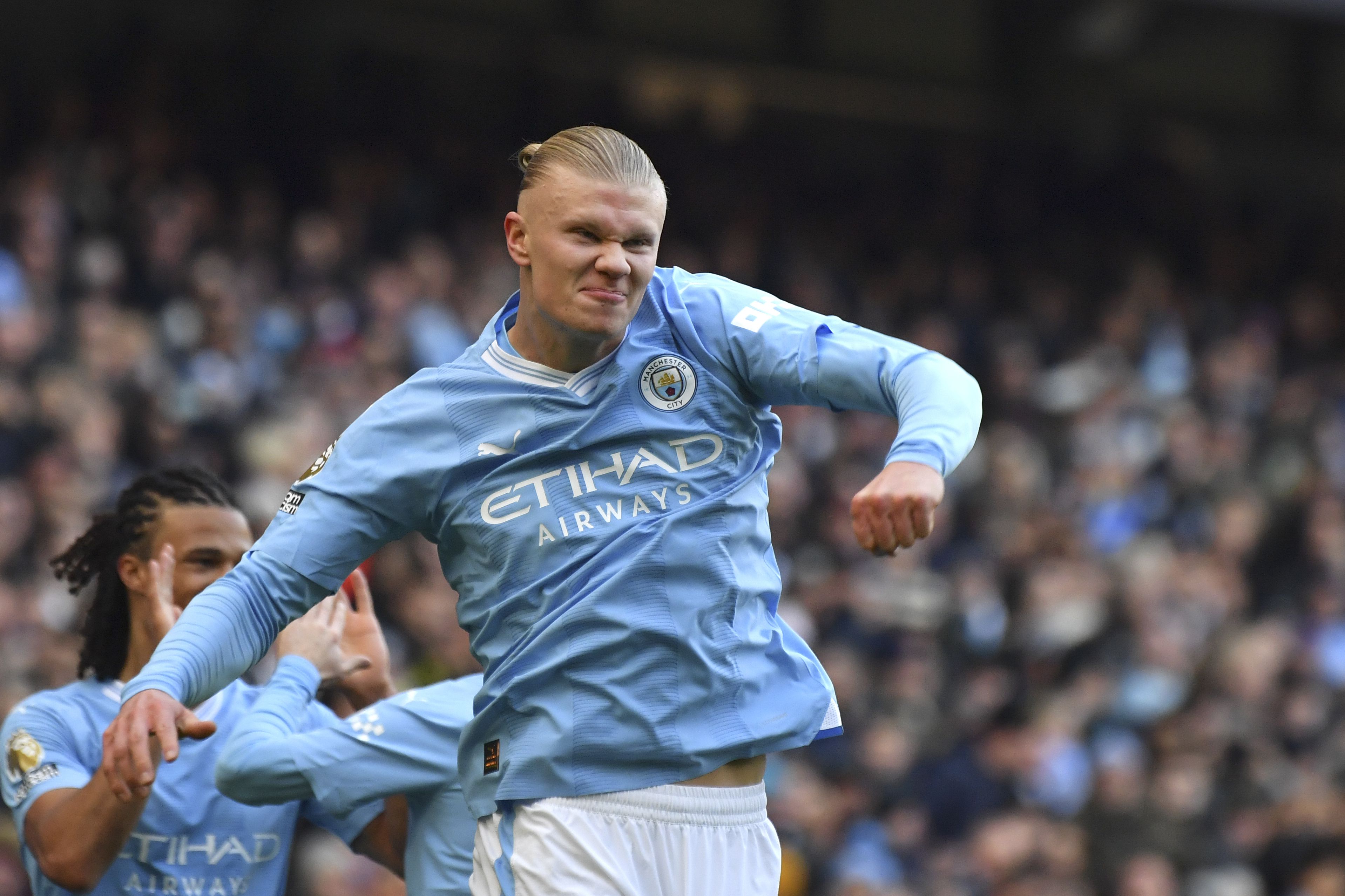 manchester city unveil statue of legends bell, lee and summerbee