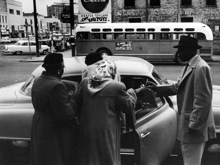 Community members pictured using the car system during the Montgomery Bus Boycott. Don Cravens / The Chronicle Collection / Getty Images