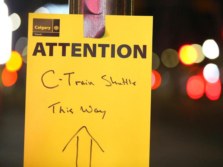 Signage directs commuters to shuttle buses at the Chinook LRT station in southwest Calgary on Monday, November 27, 2023. 