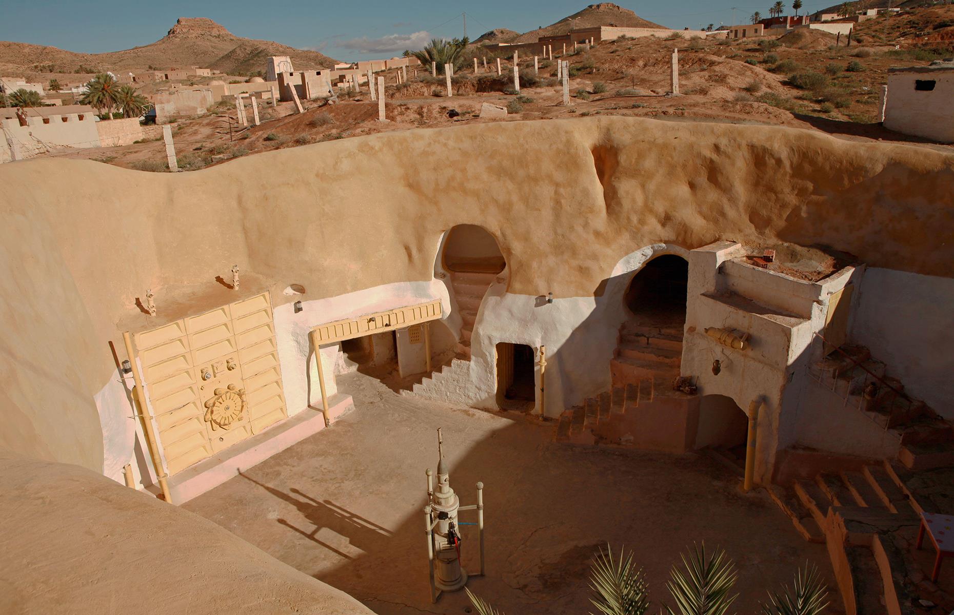 <p>Fans of the <em>Star Wars</em> franchise will appreciate this outpost in central Tunisia. Featured in <em>A New Hope</em> (the first <em>Star Wars</em> film ever released) and again in <em>Attack of the Clones</em>, the hotel doubles as the childhood home of Luke Skywalker on the planet Tatooine. The hotel itself is an excellent example of traditional Berber architecture and features plenty of nods to the famous franchise, including original frescoes and decorations harking back to its time as a film set.</p>