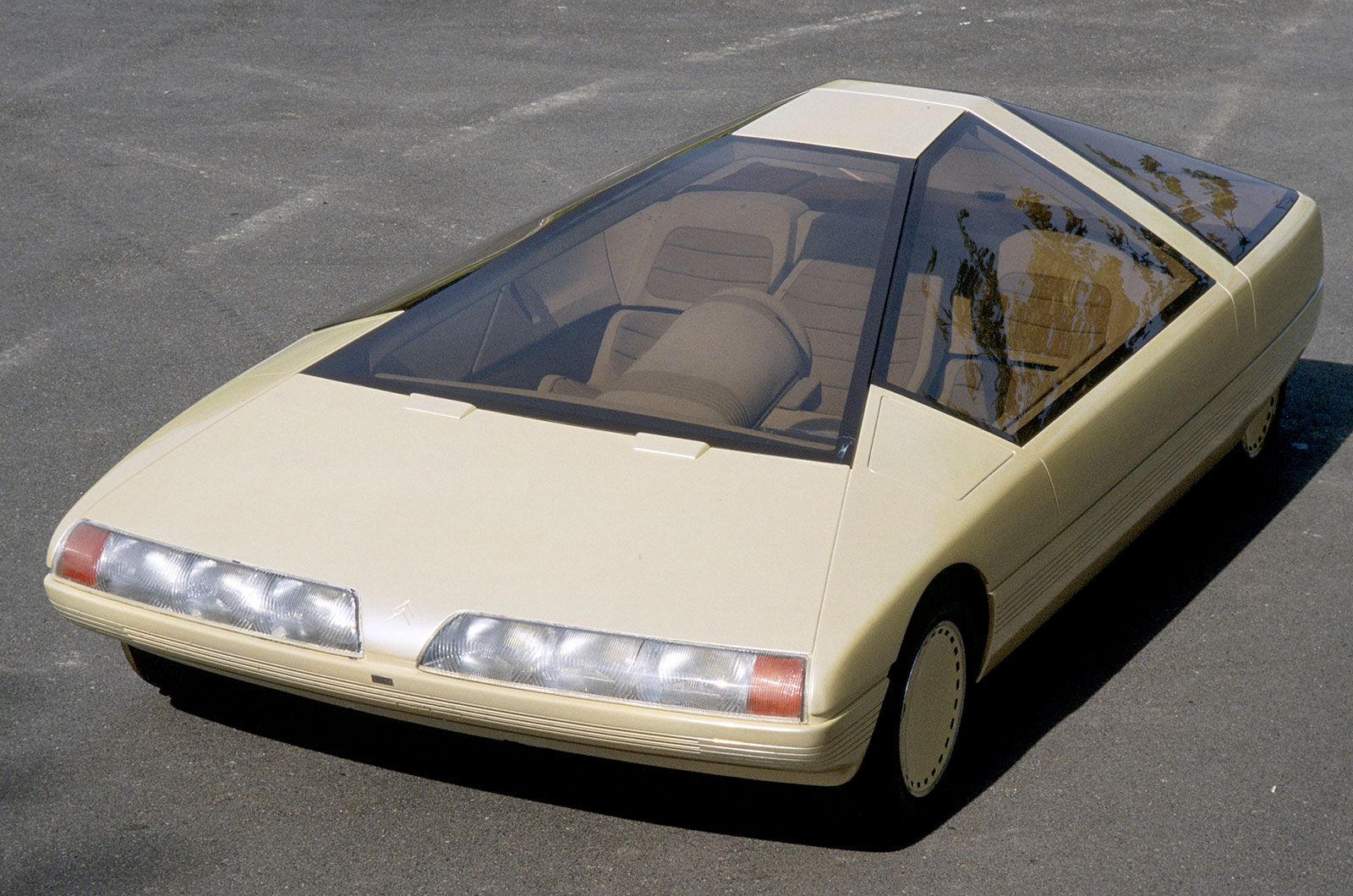 <p>The Citroën Karin was the work of <strong>Trevor Fiore </strong>(born 1937), who presumably had overdosed on Toblerone at the point that he penned this rather triangular concept. With a central driving position, the driver was flanked by a passenger on either side and behind, McLaren F1-style.</p>