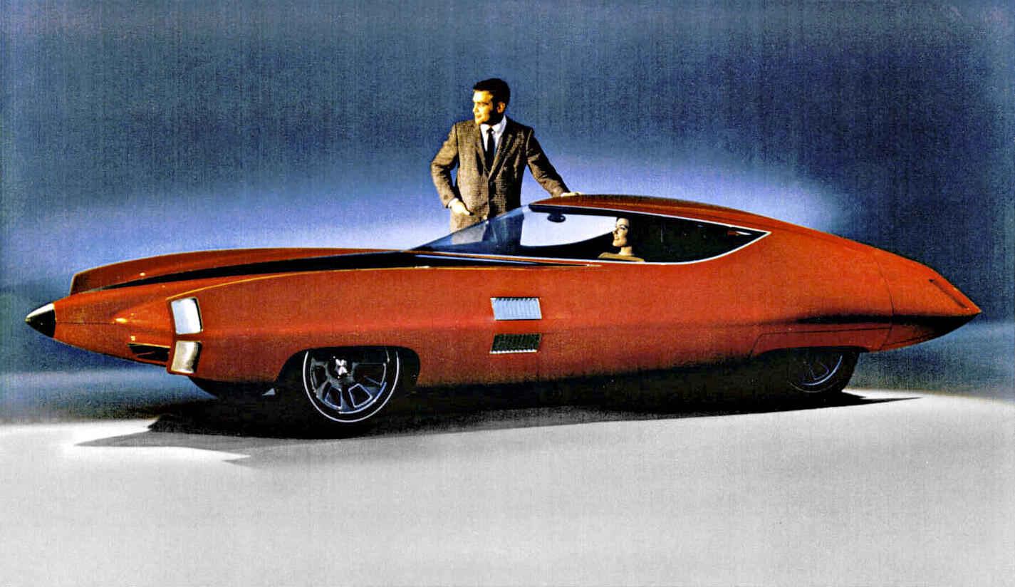 <p>Someone was clearly putting the boot in when they issued the brief for this one; a super-slippery sports car called the Stiletto. With its climate-controlled cabin, variable-ratio steering via electric motors, a rear-view camera and ultrasonic sensors around the car it was certainly prophetic, but we wouldn't fancy having to foot the bill to replace that expansive windshield when it got hit by a stone.</p>