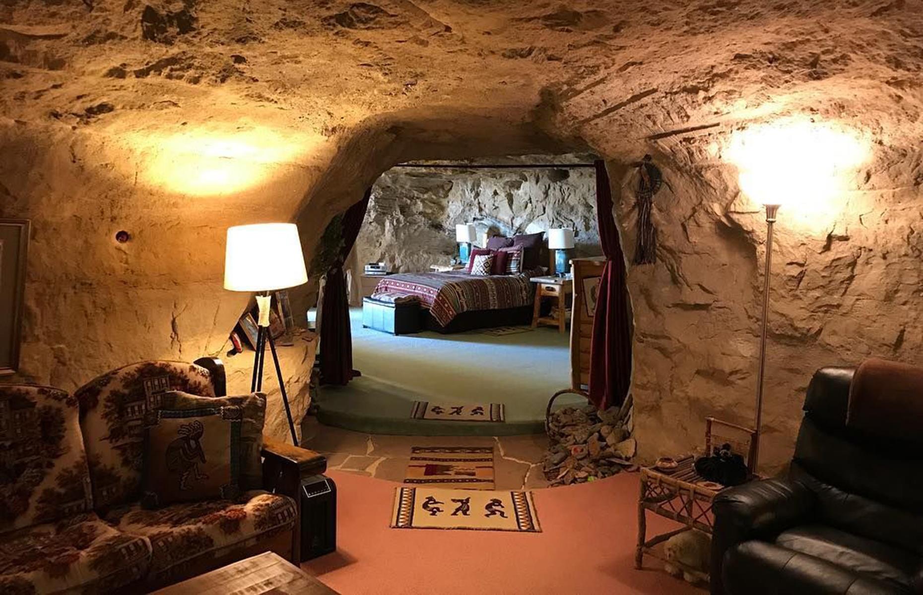 <p>A 1,700-square-foot (158sqm) underground getaway hiding in the sandstone cliffs overlooking the La Plata River Valley in New Mexico, this quaint holiday hideout welcomes intrepid travellers 70 feet (21m) below the cliff's peak. Once guests have navigated the sloping path carved into the rock that leads down to the cave, a spacious living and dining area awaits. Visitors will have the whole place to themselves, with its rock-wall waterfall, mini-Jacuzzi and stunning views out over the valley.</p>