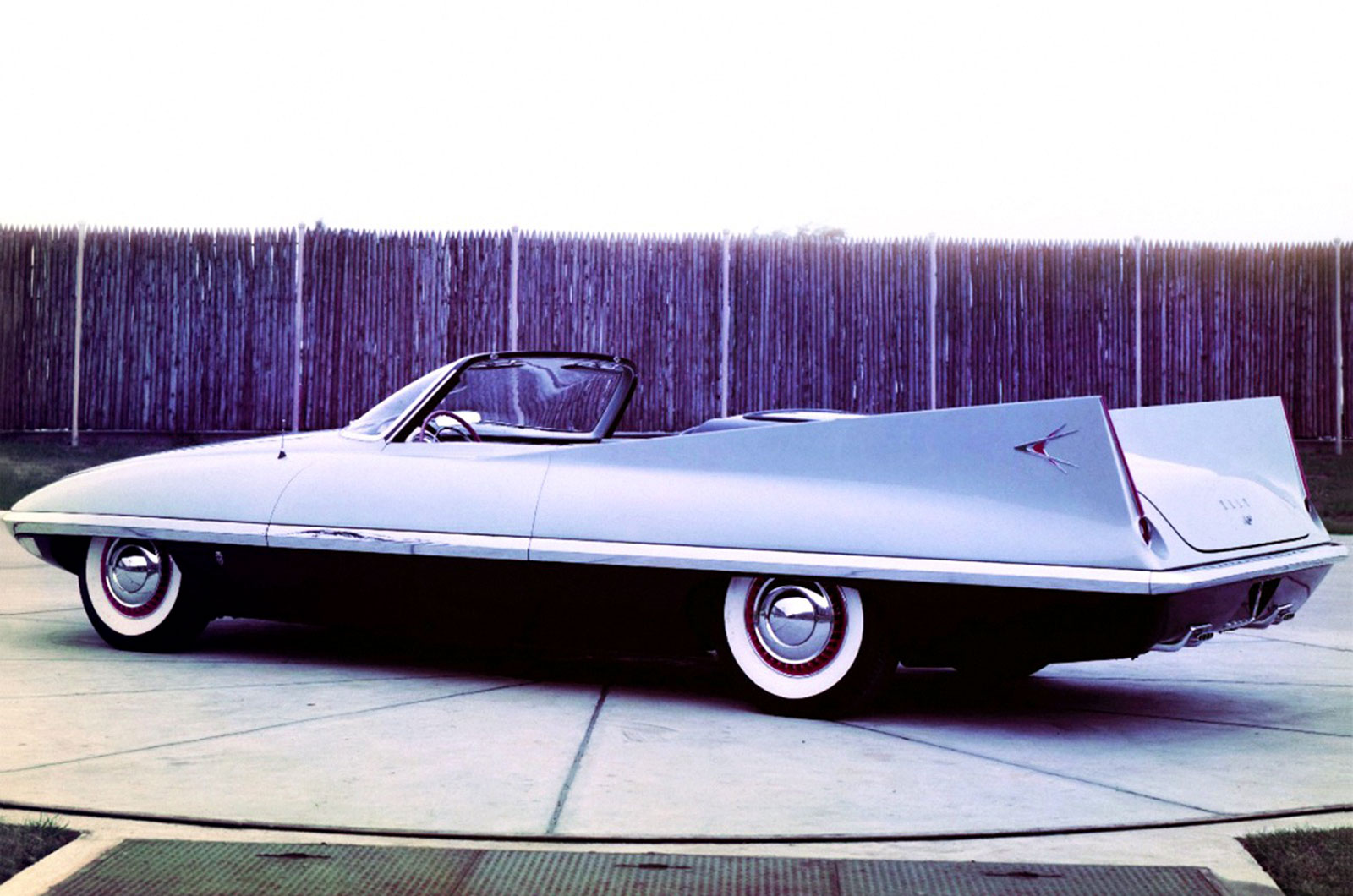 <p>Created in the wind tunnel, the Dodge Dart was the world's most aerodynamic car when it was unveiled in 1956. Dodge claimed that the Dart had less than one third of the drag of the most aerodynamic production cars of the time. Capable of seating four, the Dart's steel roof could be kept in place or retracted into a concealed compartment behind the rear seat.</p>