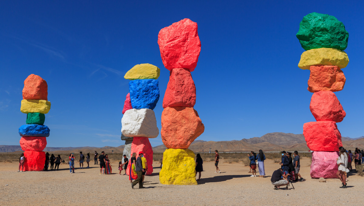 <p>The trip from Las Vegas to Hoover Dam and the Grand Canyon takes you through the expansive desert of Arizona, where you can see Joshua Trees and maybe desert big horn sheep. Some tours will take you to Seven Magic Mountains, an art installation featuring these towering, painted boulder totems by artist Ugo Rondinone.</p>