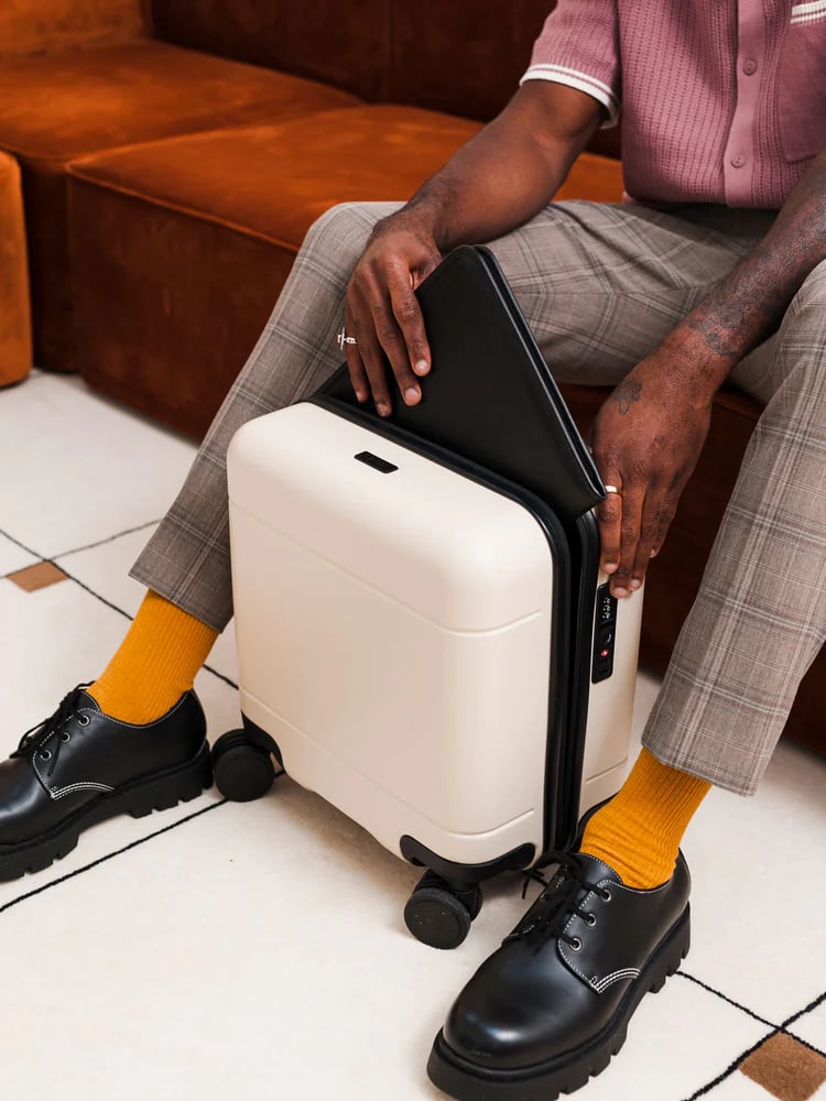<p><a href="https://www.calpaktravel.com/products/hue-mini-carry-on-luggage/linen">BUY NOW</a></p><p>$132</p><p><a href="https://www.calpaktravel.com/products/hue-mini-carry-on-luggage/linen" class="ga-track"><strong>Calpak Hue Mini Carry-On Luggage</strong></a> ($132, originally $165)</p> <p>The Calpak Hue Mini Carry-On Luggage doesn't compromise on style or functionality. This personal-item carry-on bag has a polycarbonate hard-shell exterior that can withstand scuffs and bumps. The cool thing with this bag is that it opens upright, so you'll be able to easily see and access everything in your bag. It has an interior divider with pockets and compression straps to keep your overpacked bag organized. It has a TSA-accepted lock, a collapsable luggage handle, and four 360-degree spinner wheels for a smooth, upright roll. Choose between a three colors. And, yes, this small rolling bag fits beneath most airline seats.</p> <p><strong>Dimensions:</strong> 14" height x 16" width x 8.5" depth</p>