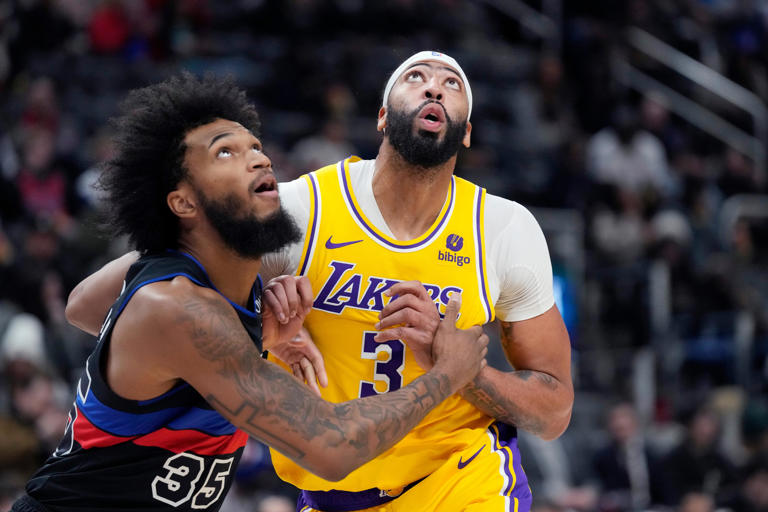 Pistons forward Marvin Bagley III and Lakers forward Anthony Davis wait on the rebound during the second half of the Pistons' 133-107 loss on Wednesday, Nov. 29, 2023, at Little Caesars Arena.