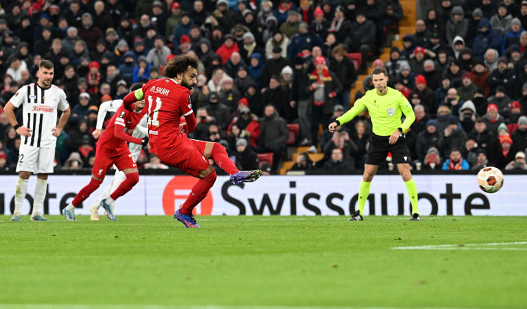 Salah moves on to 199 club goals with a flawless penalty (Liverpool FC via Getty Images)