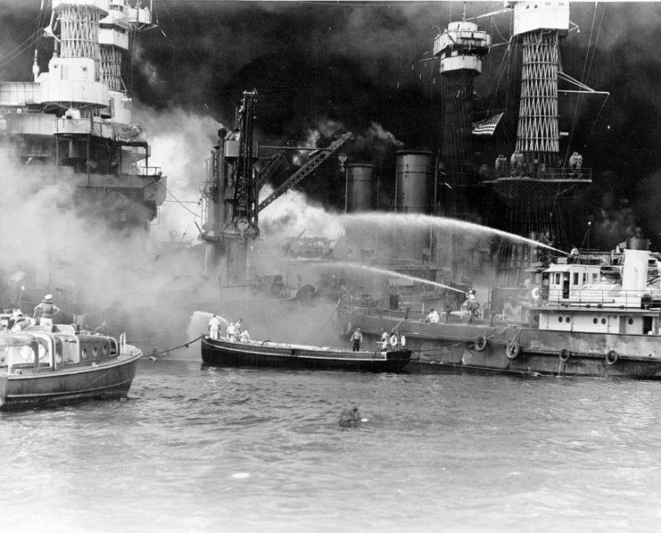 USS West Virginia on fire after being hit during the attack on Pearl Harbor. (Photo Credit: Universal History Archive / UniversalImagesGroup / Getty Images)