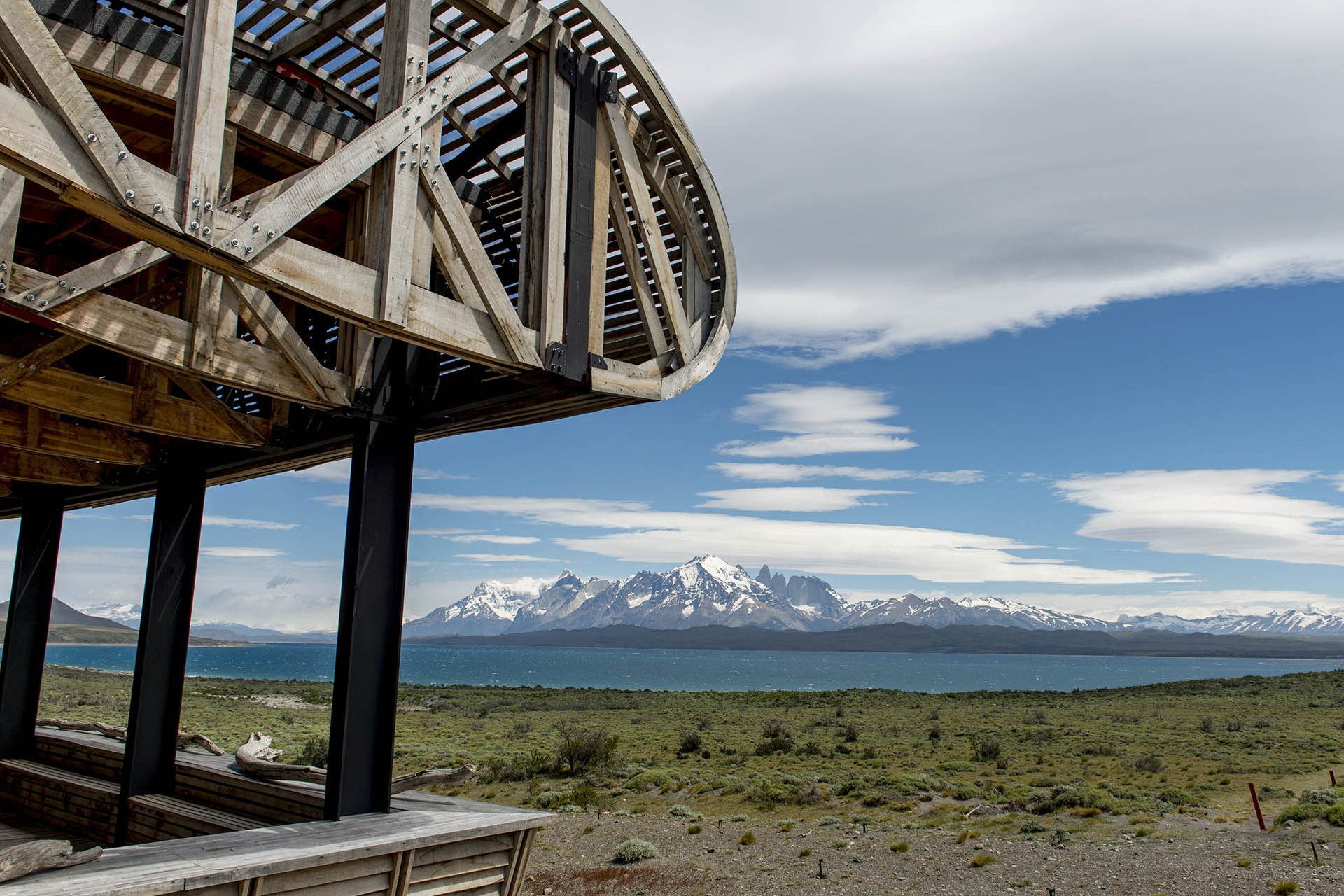 <p>This curious hotel, located in an idyllic location surrounded by nature at the northern entrance to the Torres del Paine National Park (Chile), was designed by architect Cazú Zegers. It has a curved, sinuous shape that blends with the landscape and is entirely covered by a plank of washed beech wood.</p>