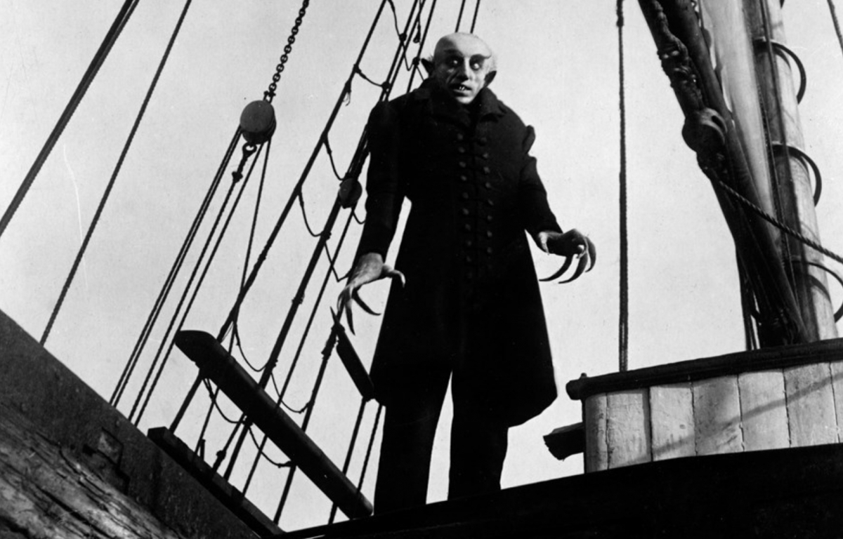 <p>Nosferatu is one of the most iconic films of all time, a silent German horror production directed by F. W. Murnau and released in 1922. It is an unauthorized adaptation of Bram Stoker's novel "Dracula", and despite facing legal issues with the writer's heirs, it has left a lasting mark on the history of cinema and the horror genre. Max Schreck's portrayal of Count Orlok has become legendary over the years.</p> <p>The story follows the vampire, who expresses interest in a new residence and the wife of real estate agent Hutter. The project not only introduced technical innovations in the cinematography of the time but also included the use of stop-motion technique and special effects to achieve the supernatural appearance of Orlok and other fantastic elements.</p>