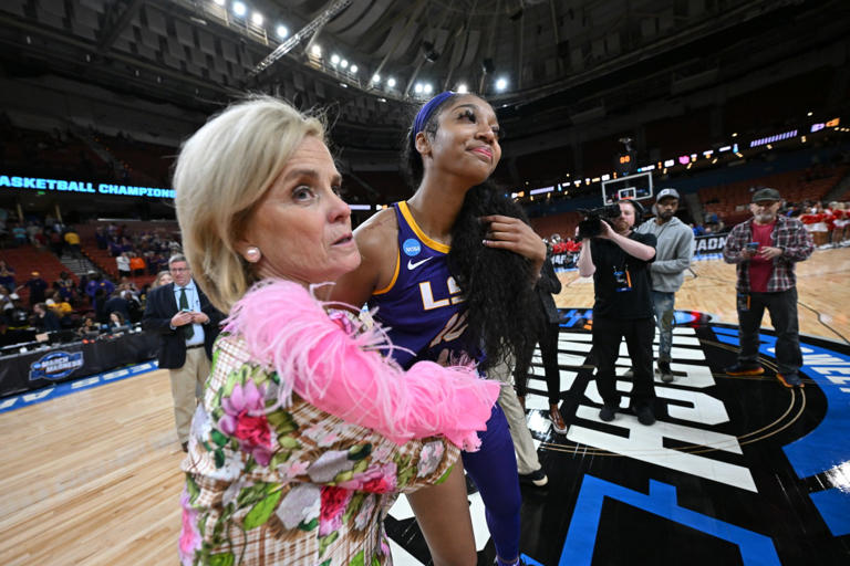 GREENVILLE, SC - MARCH 24: Head Coach Kim Mulkey of the LSU Tigers celebrates with Angel Reese #10 of the LSU Tigers after a win over the Utah Utes during the Sweet Sixteen round of the 2023 NCAA Womens Basketball Tournament held at Bon Secours Wellness Arena on March 24, 2023 in Greenville, South Carolina. (Photo by Grant Halverson/NCAA Photos via Getty Images) Grant Halverson/Getty Images