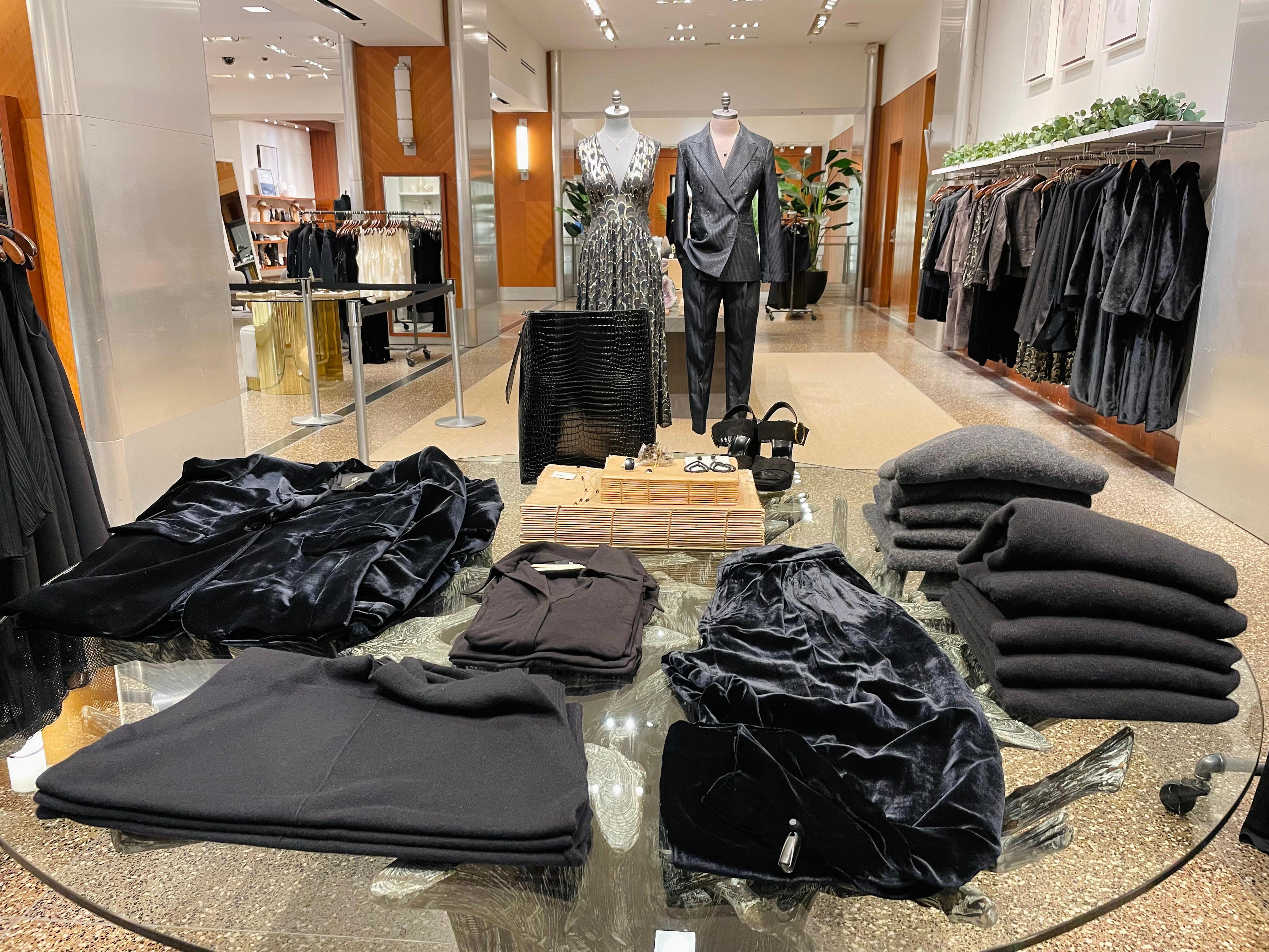 <p>A black velvet suit set was laid out on a glass table, which made it a bit difficult to picture how it would fit.</p>